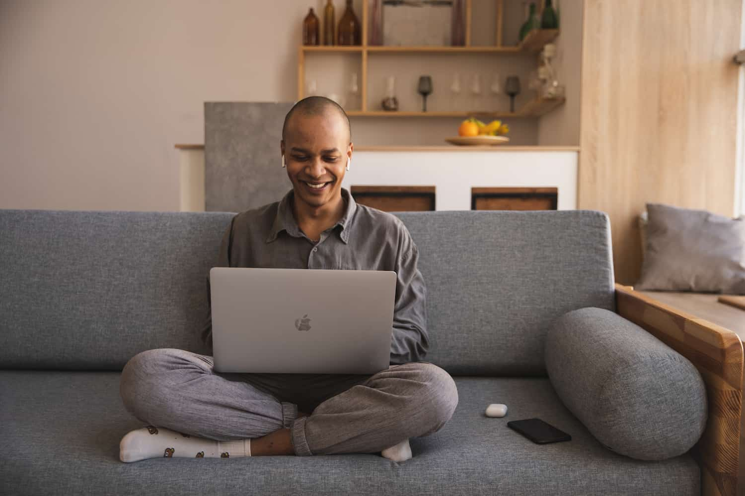  Remote worker on his laptop at home