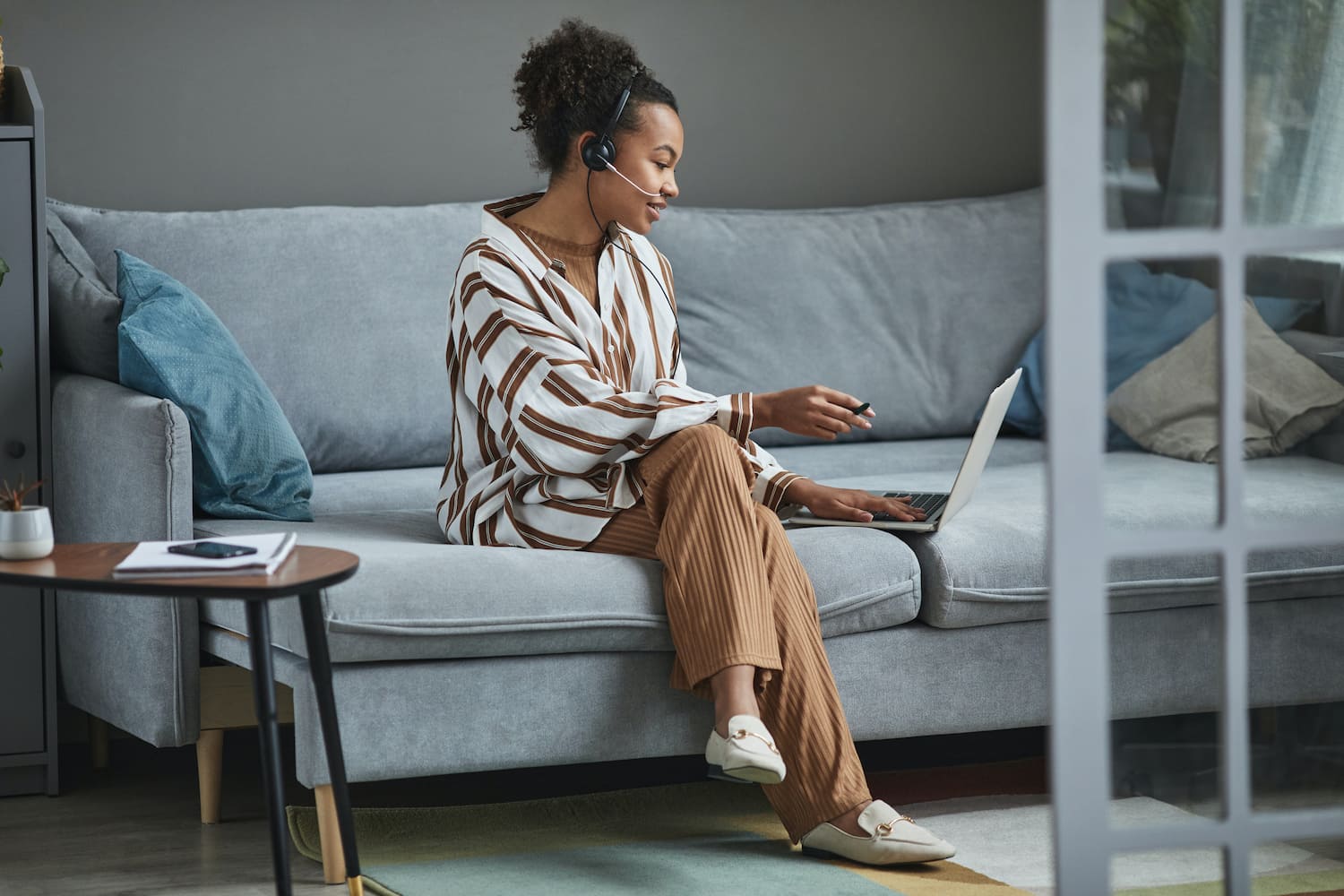  A remote worker enjoys her flexibility to work from home.