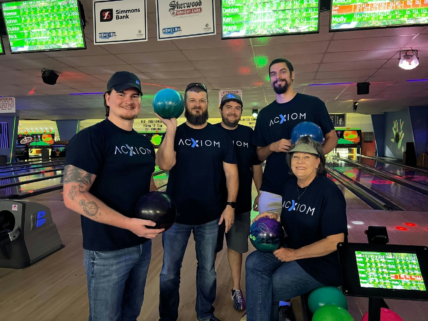 Associates enjoying a fun game of bowling