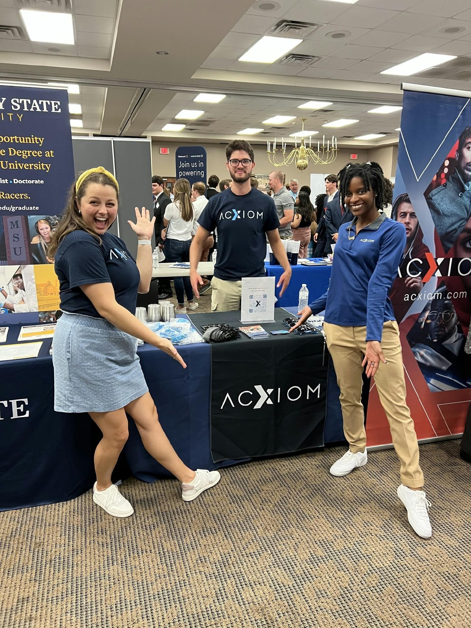 Acxiom associates representing at an expo event