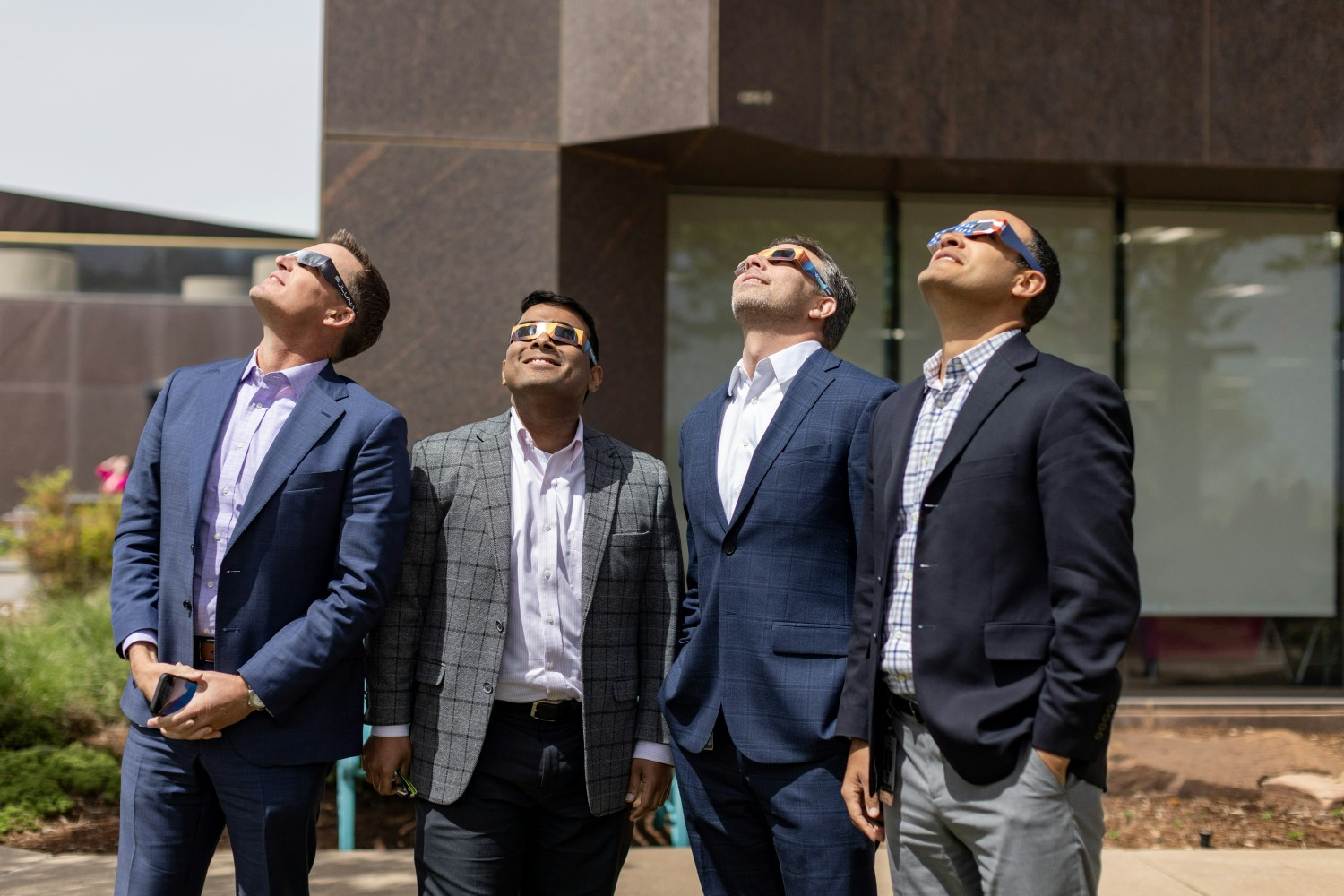 AF Colleagues took a few minutes out of their day to take a peek at the solar eclipse. 