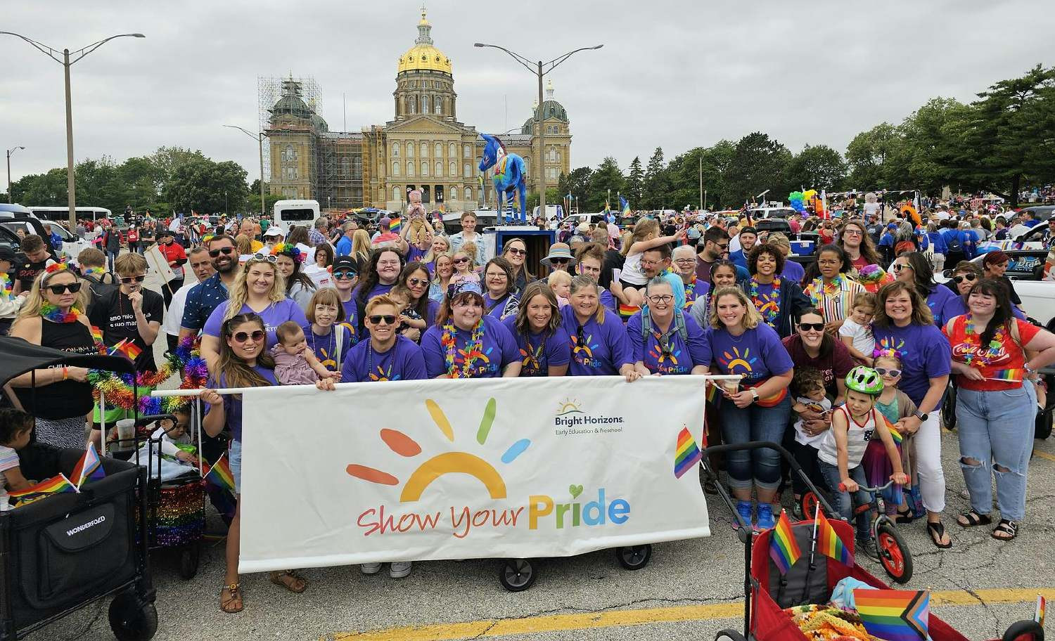 Staff members representing Bright Horizons and showing their pride at the Pride Parade in Des Moines, Iowa. 