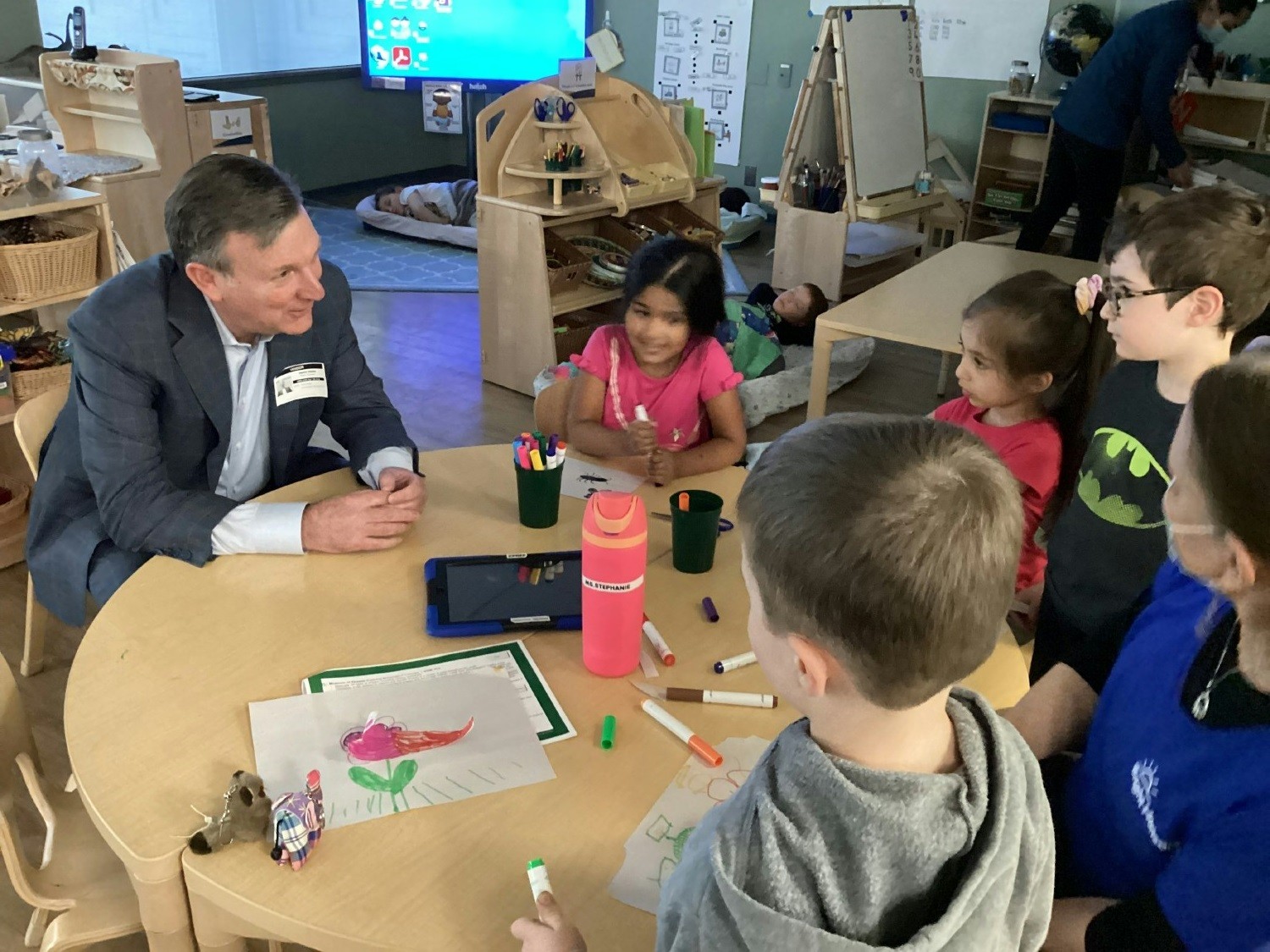 CEO Stephen Kramer visits with children in one of our New York child care centers.