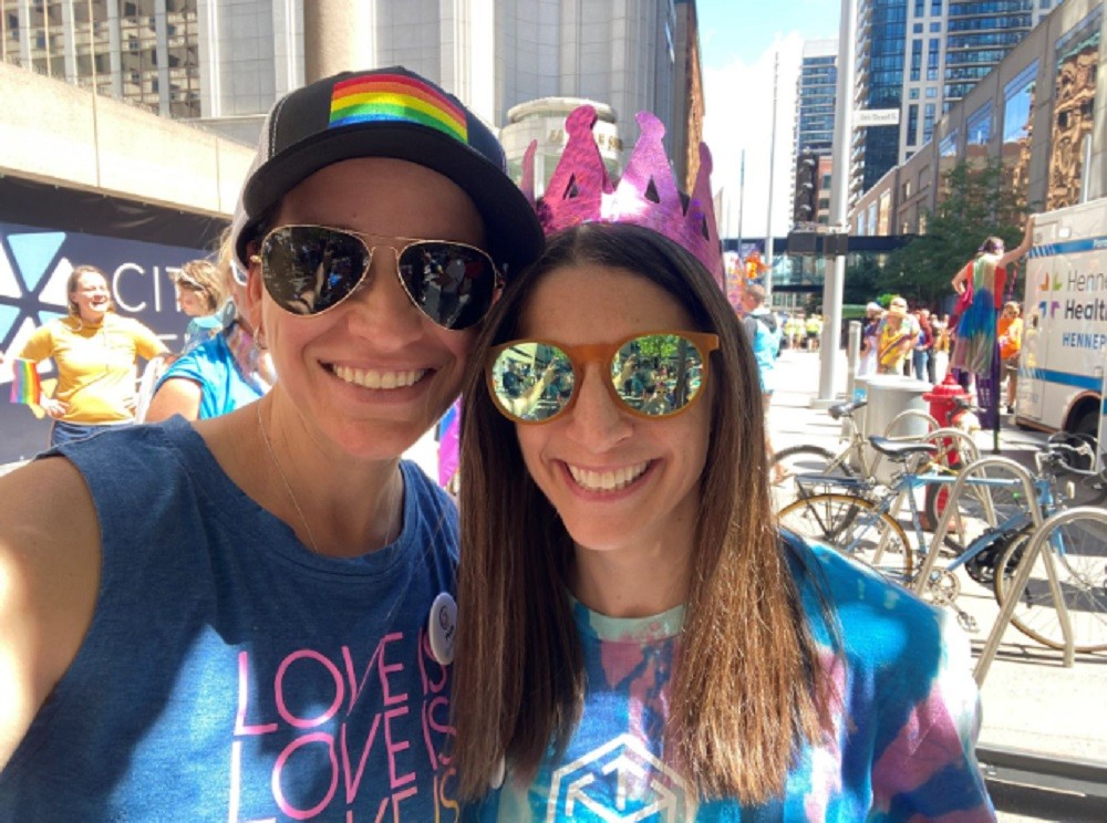 Allies in business and friendship as team members show their support in the Twin Cities Pride Parade.  
