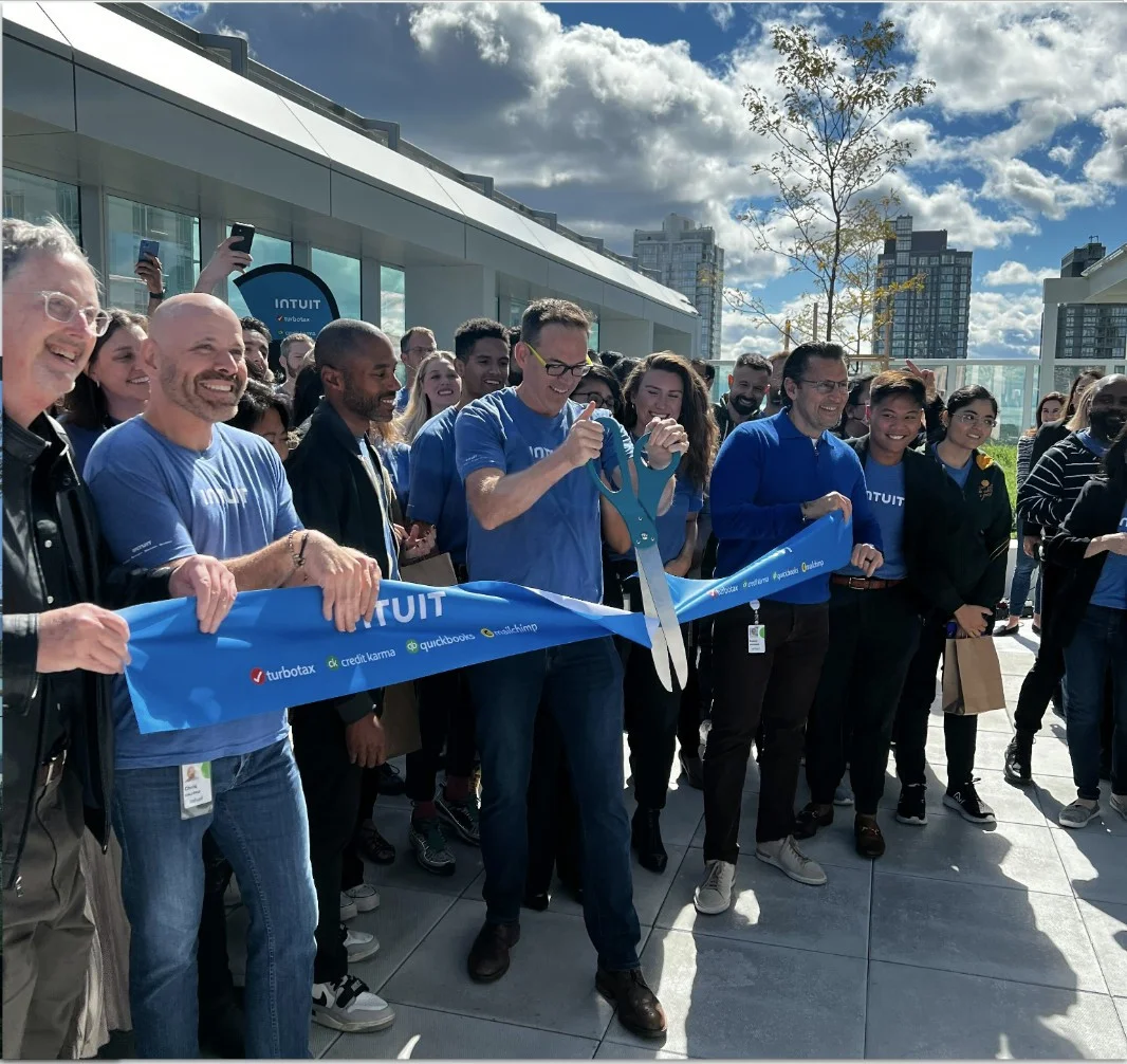 CEO ribbon cutting to open new office location