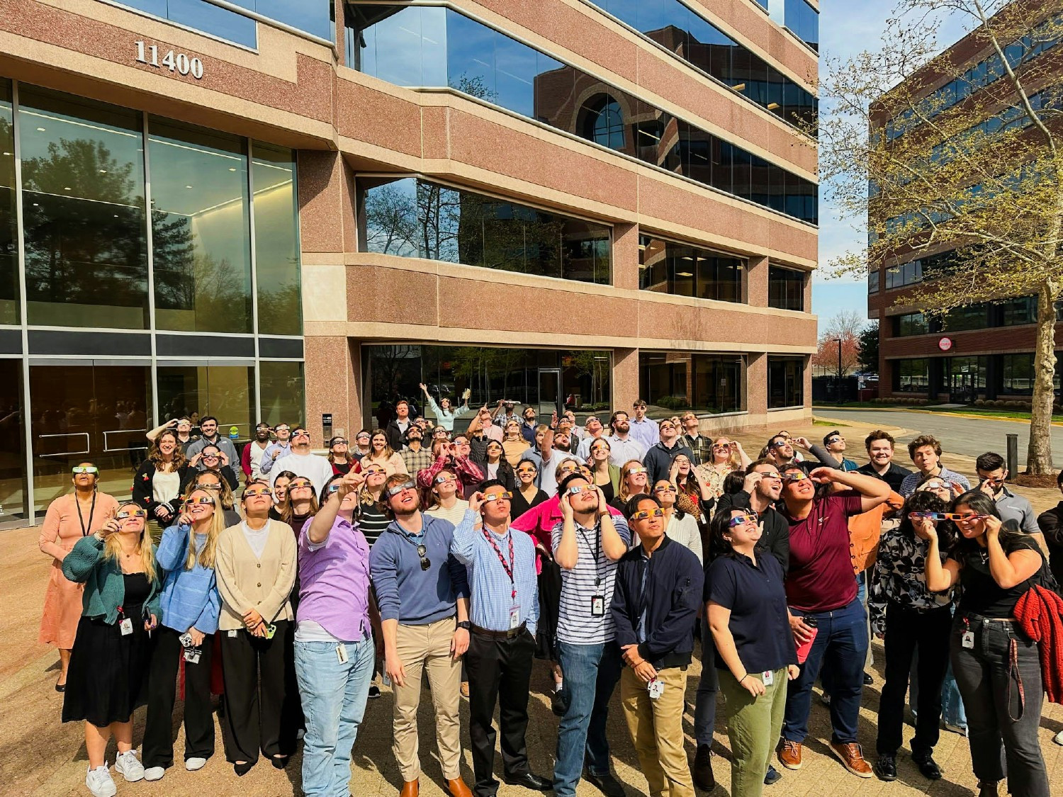 Out of this world! Employees across the country experience a total solar eclipse together.