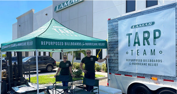 The Tarp Team donates and distributes used billboard vinyl to communities hit by severe storms to use on their homes.