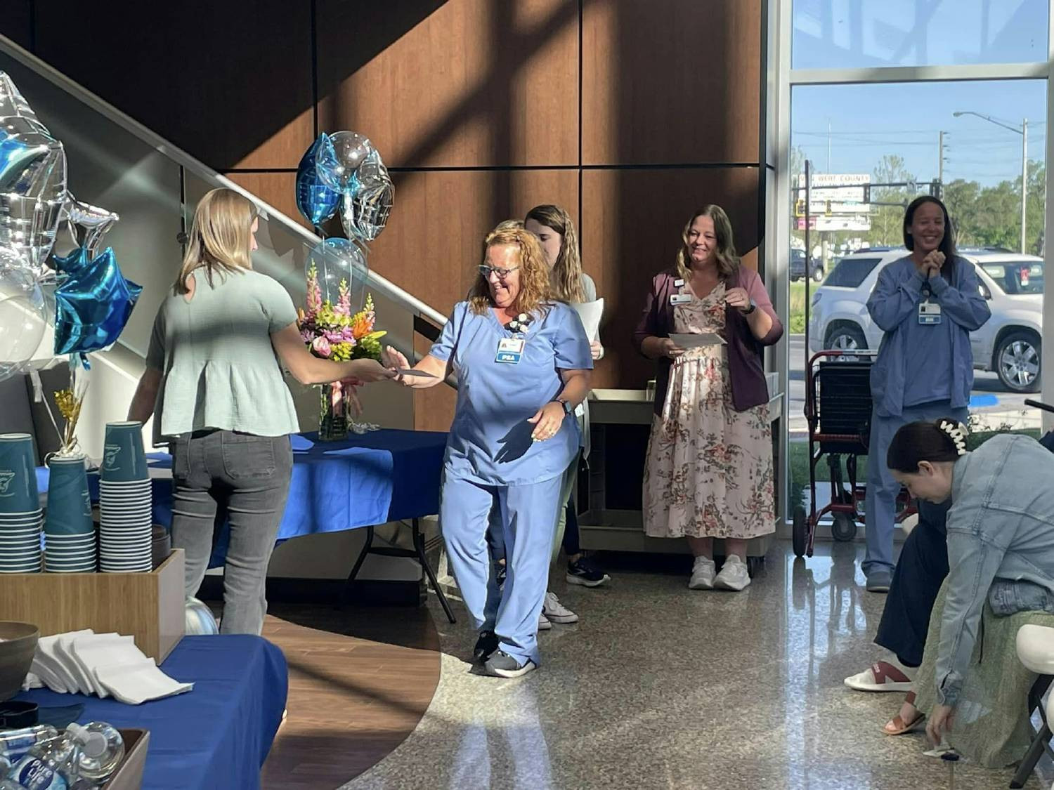 Nurses and peers celebrating nursing scholarship recipients and the nursing profession during Nurses Week.