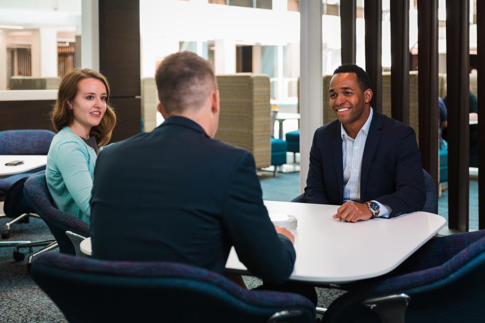 Leadership Development Program candidates talk things over in our many meeting areas inside the 711 Atrium