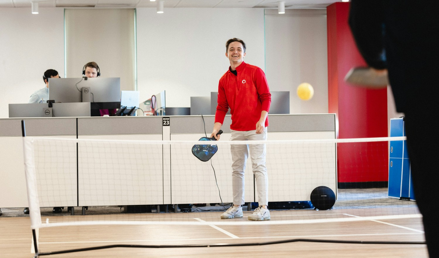 Rocket team members take a quick break during the workday to play pickleball right on one of the company’s floors