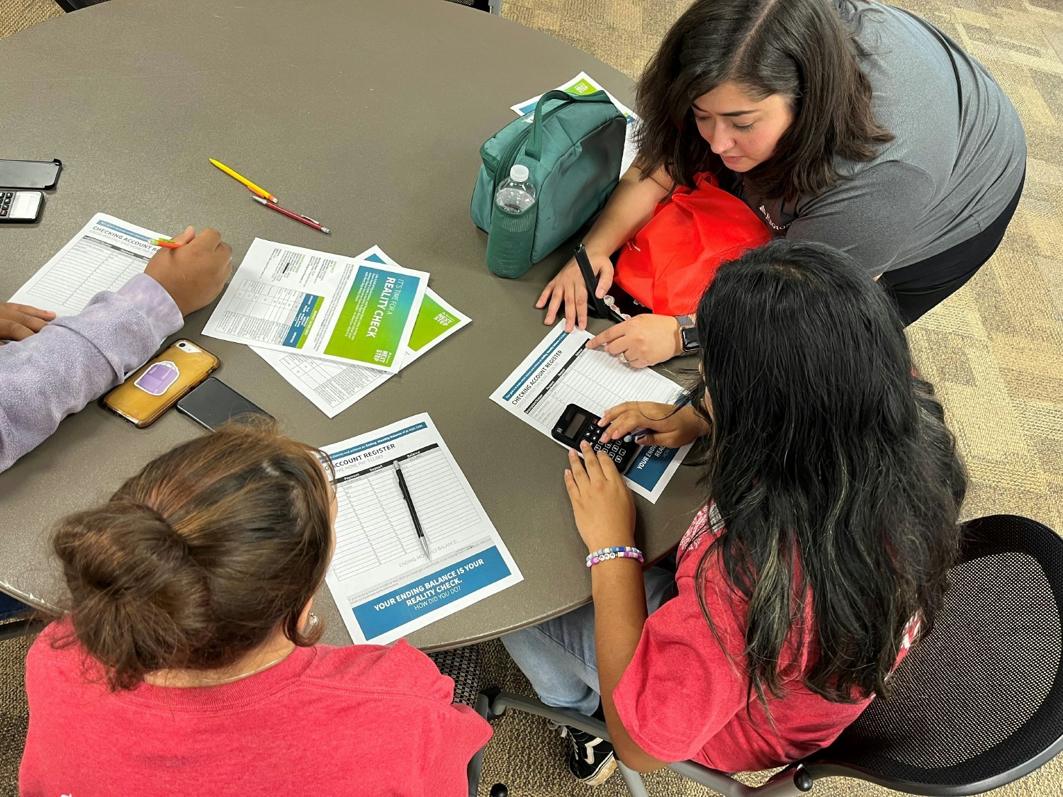 A Regions associate assists during a Financial Literacy for Students class.