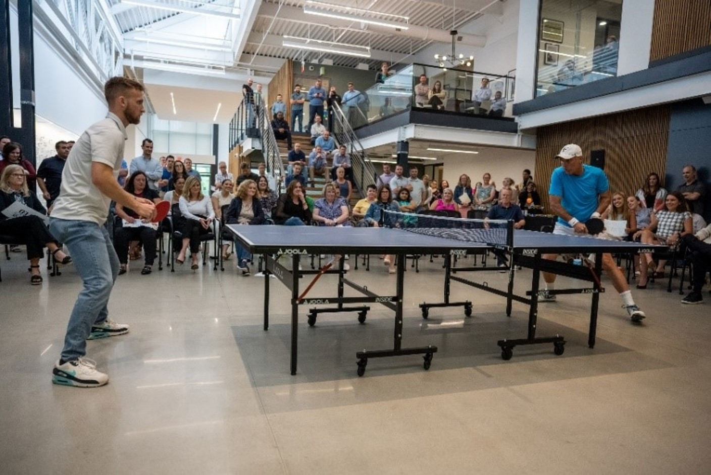 Toll Brothers Ping Pong Championship – Corporate employees cheer on an employee as he faces off against our CEO