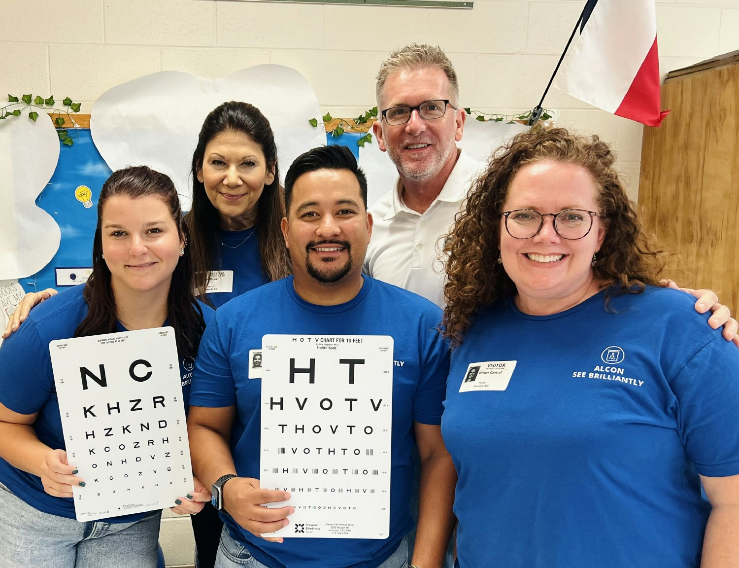 Alcon associates volunteer as trained vision screeners for underserved elementary school children.