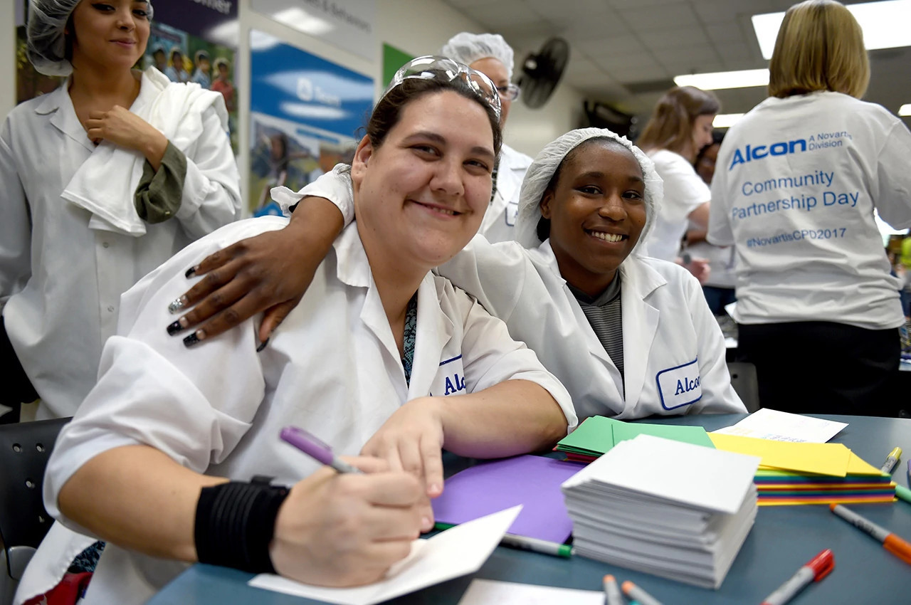 Alcon manufacturing associates pause to volunteer together during our annual community service initiative.