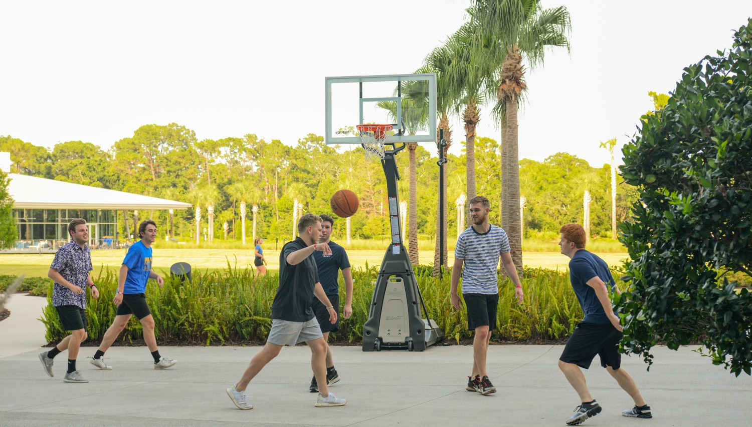 KPMG interns enjoying a game of basketball while visiting Lakehouse, the firm's innovation and learning center. 