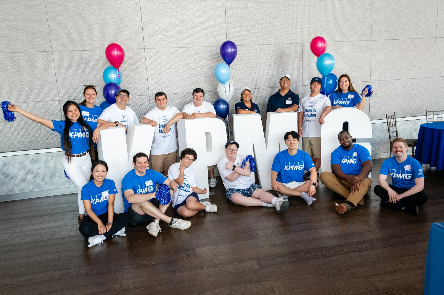 KPMG interns participate in a team-building exercise at the KPMG Lakehouse learning and innovation center. 