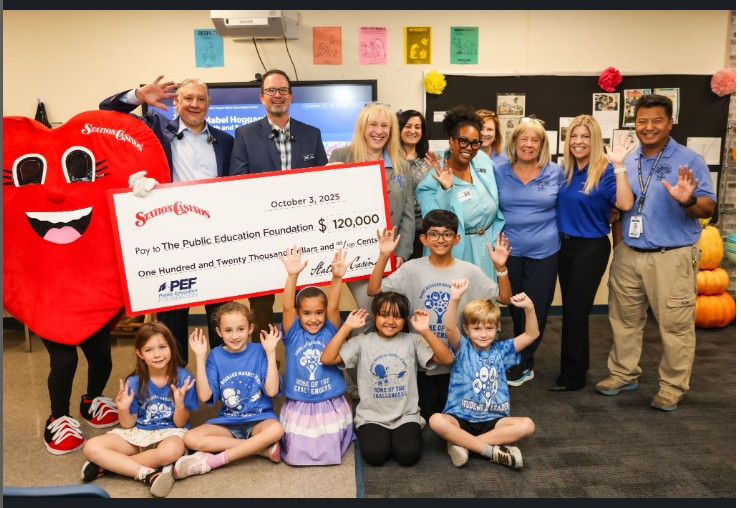 Santa Fe school check presentation group picture