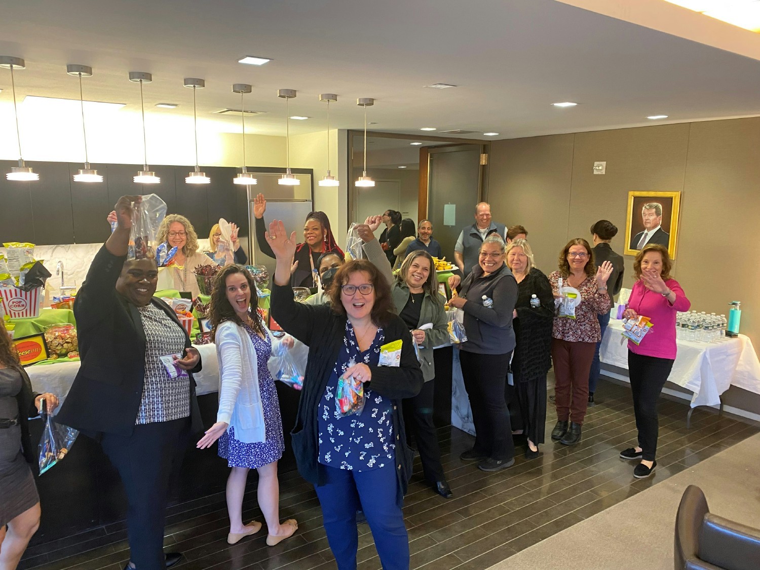 Employees gather in the firm lounge to connect and grab fun snacks during our Wellness Week in Law celebration.