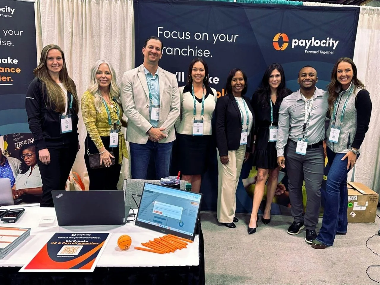 Paylocity employees at a conference 