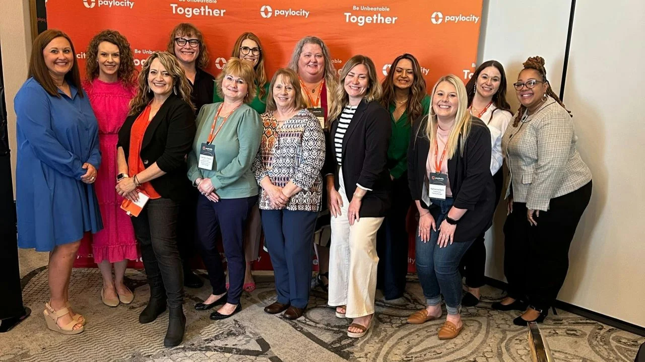 Paylocity employees at a conference