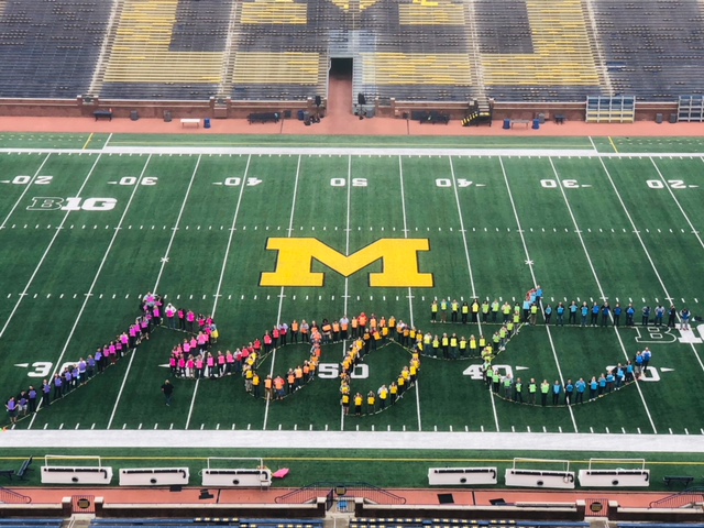 Every year, we have our State of Root which is like a conference for ourselves. All of our Rootsters come together to celebrate our culture, build skills and capabilities and talk about how we are performing as a business. Last year, we captured a group photo and marched on to the University of Michigan's football field and spelled Root by all of us holding a different color of paper. How cool did this turn out!?