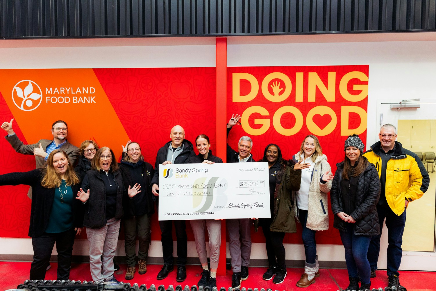 Sandy Spring Bank employees volunteering at the Capital Area Food Bank.