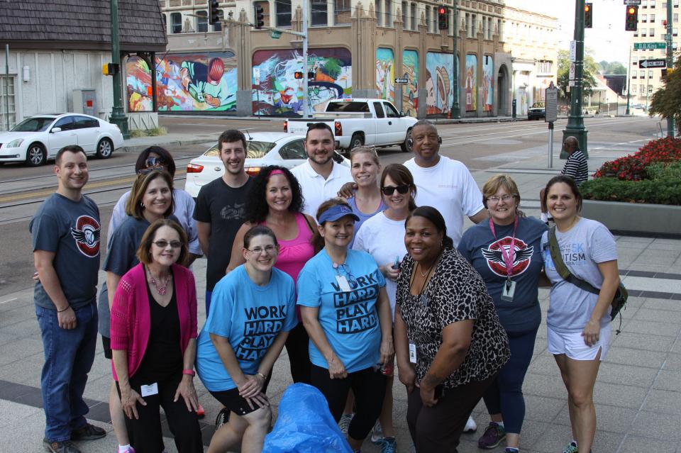 Combining fitness with a downtown clean-up -- our crew prepares to play pick-up-trash bingo!