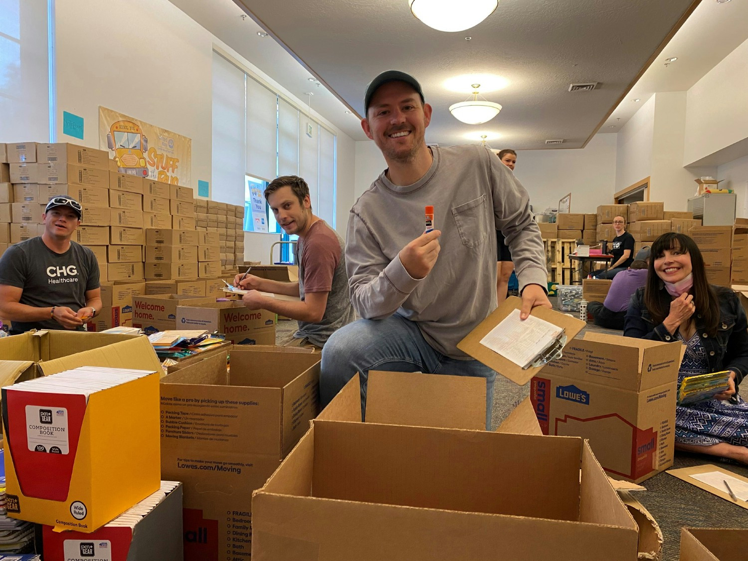 A few employees using some unlimited team VTO to sort school supplies for United Way of Salt Lake's 