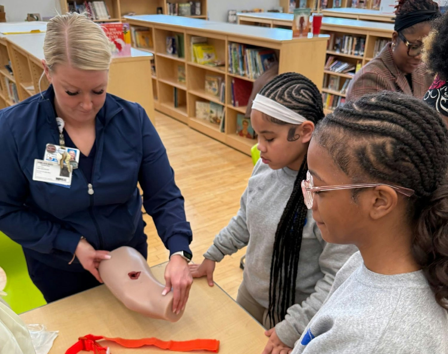LifeBridge Health staff teaching first aid to elementary and middle school students