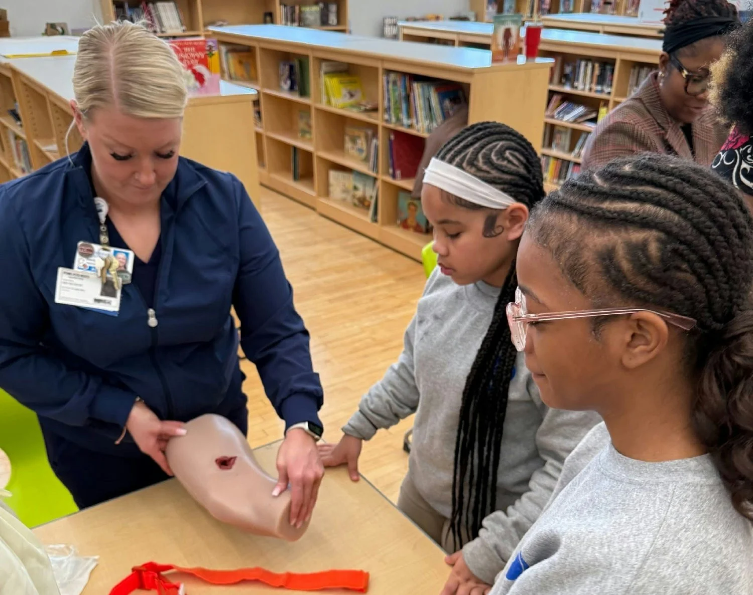 LifeBridge Health staff teaching first aid to elementary and middle school students