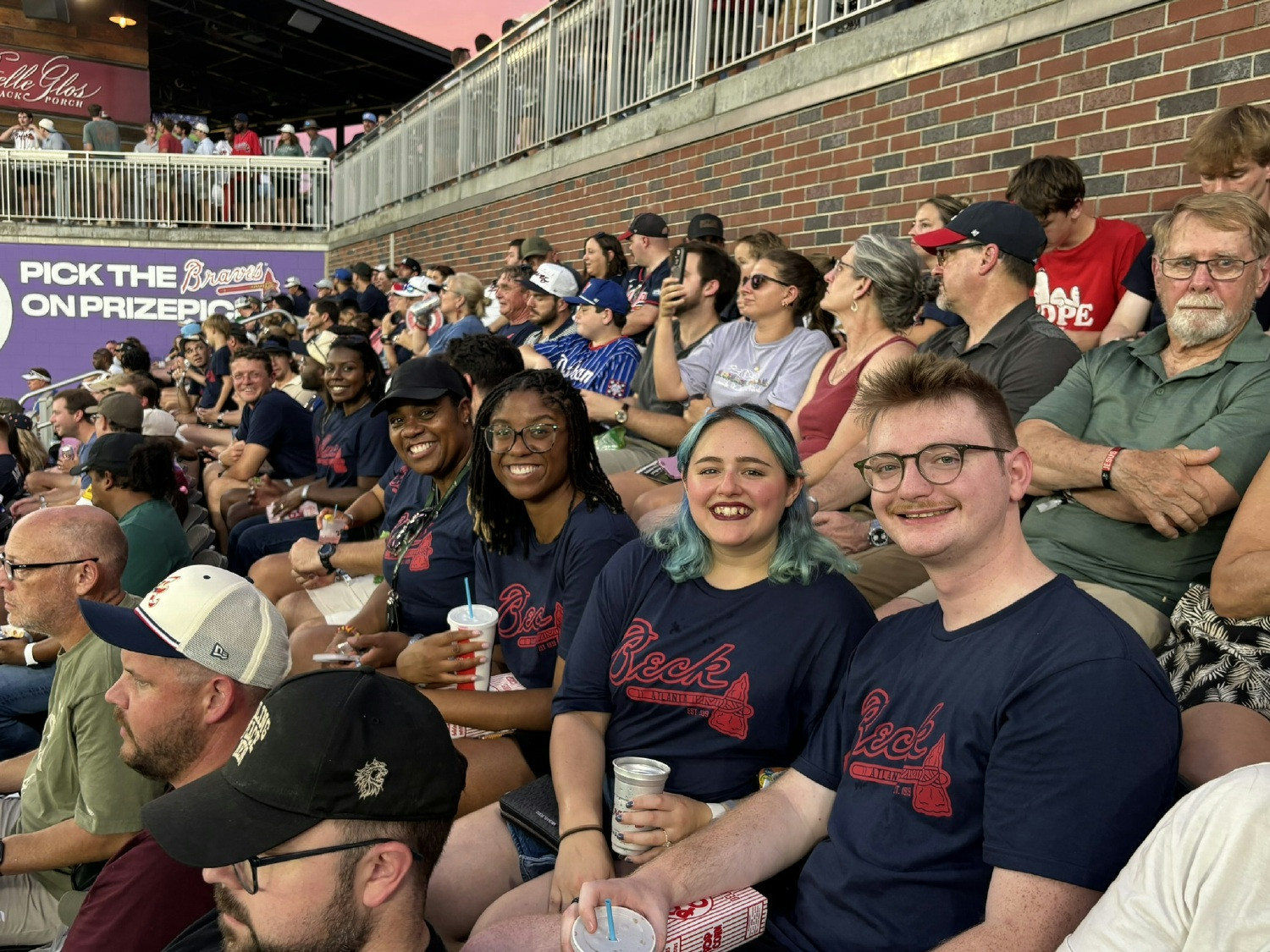 Atlanta employees enjoy a Beck Connect outing at a Braves game, building connections beyond the workday.