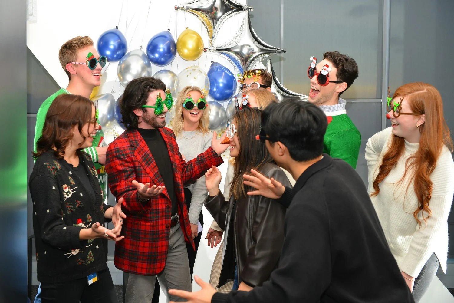 Our Seattle office enjoying their annual holiday party together in the office. 