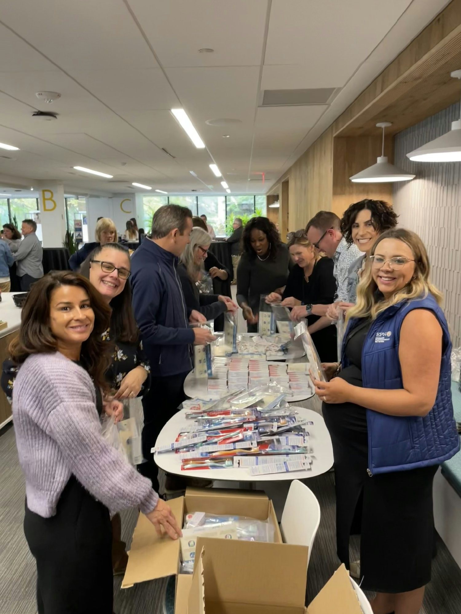 Members of our Emerging Professionals Network hosted a networking event assembling oral health kits.