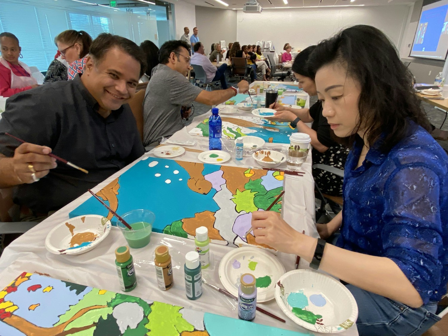 SAP Atlanta participating in People Experience Day coming together through art.