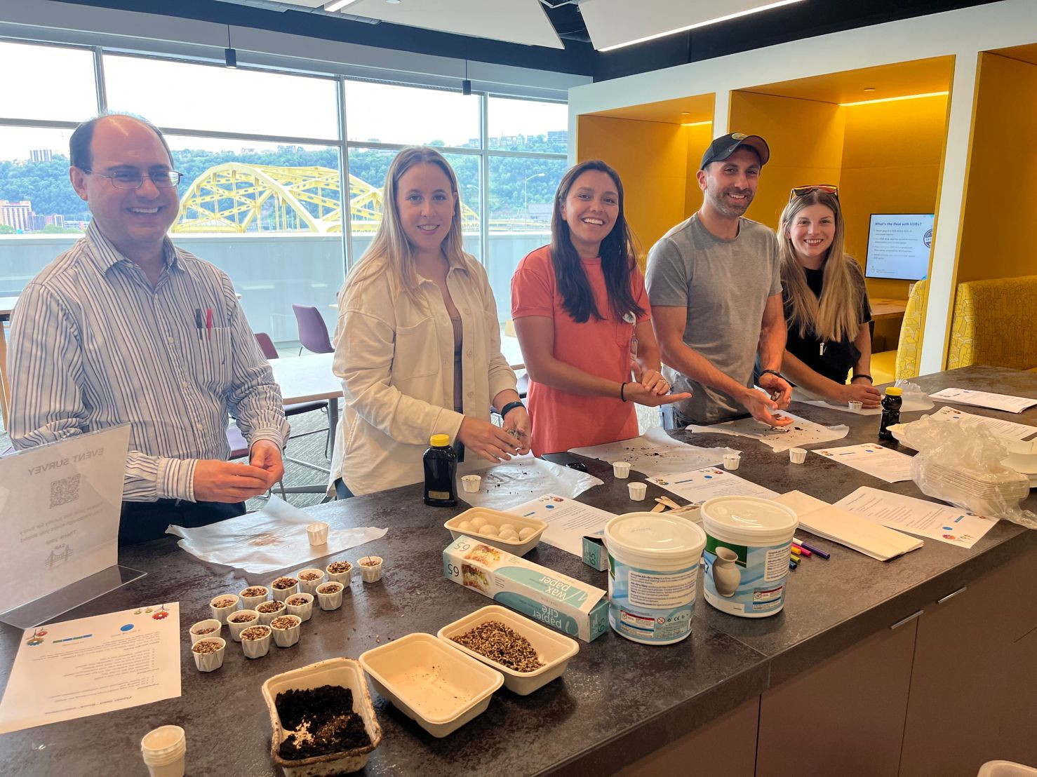 SAP Pittsburgh site volunteers preparing for an interactive activity on Take Your Child to Work Day