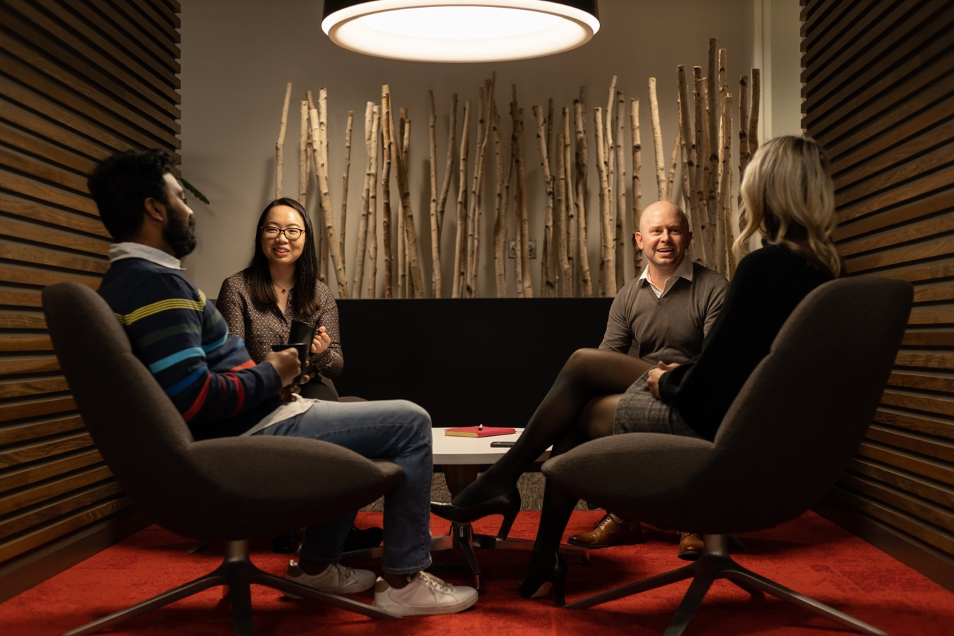 A group of Mastercard employees gather at the St. Louis Tech Hub.