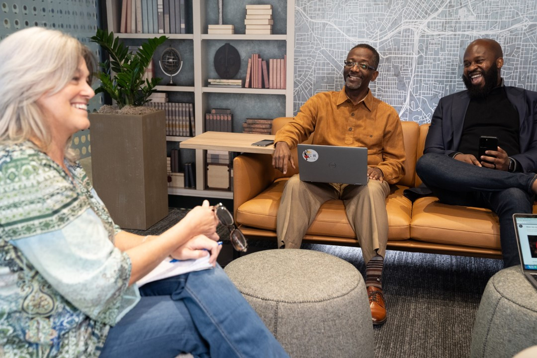 Mastercard employees greet each other in our neighborhoods.