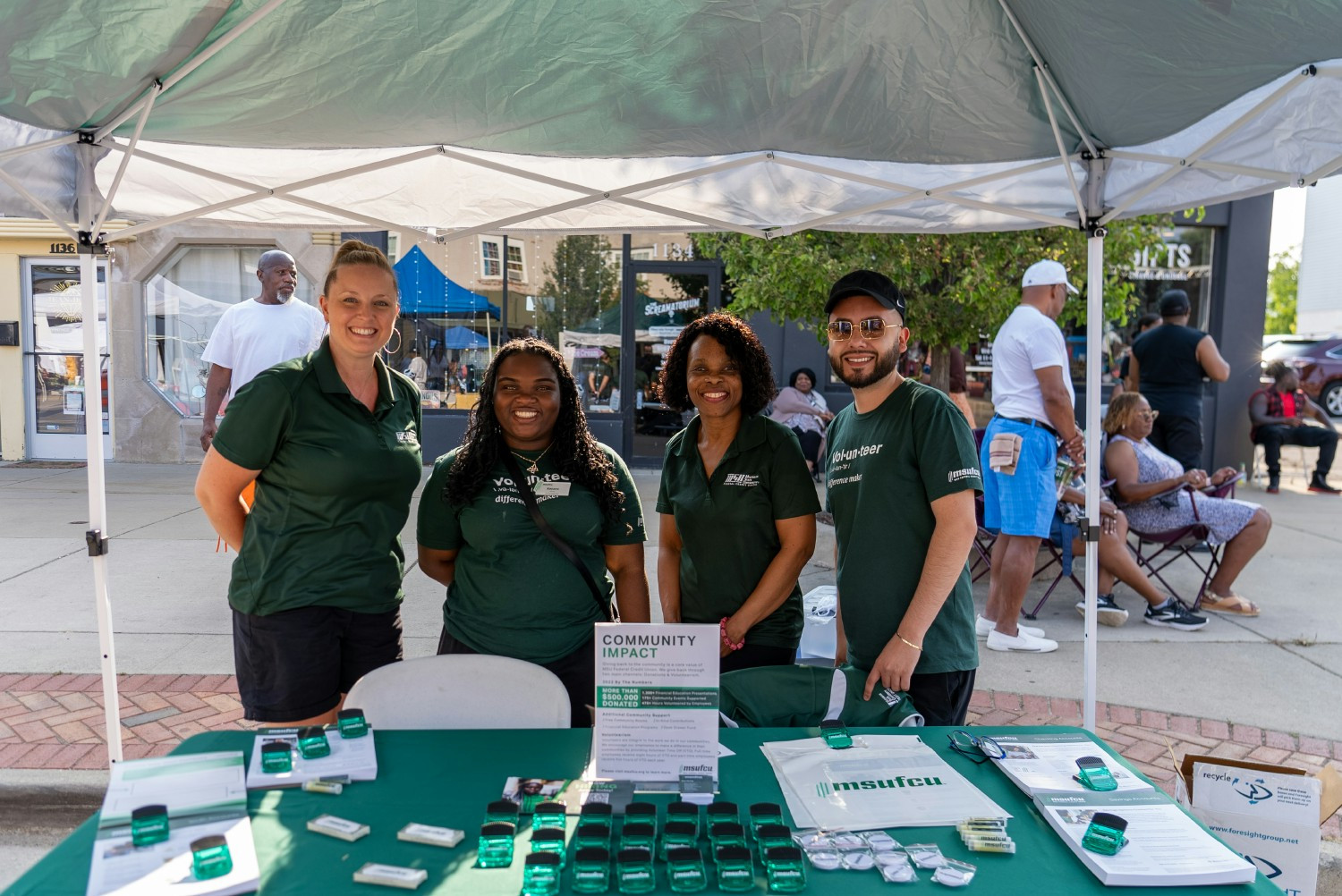 A group of employees volunteering at the 517 Juneteenth Festival.