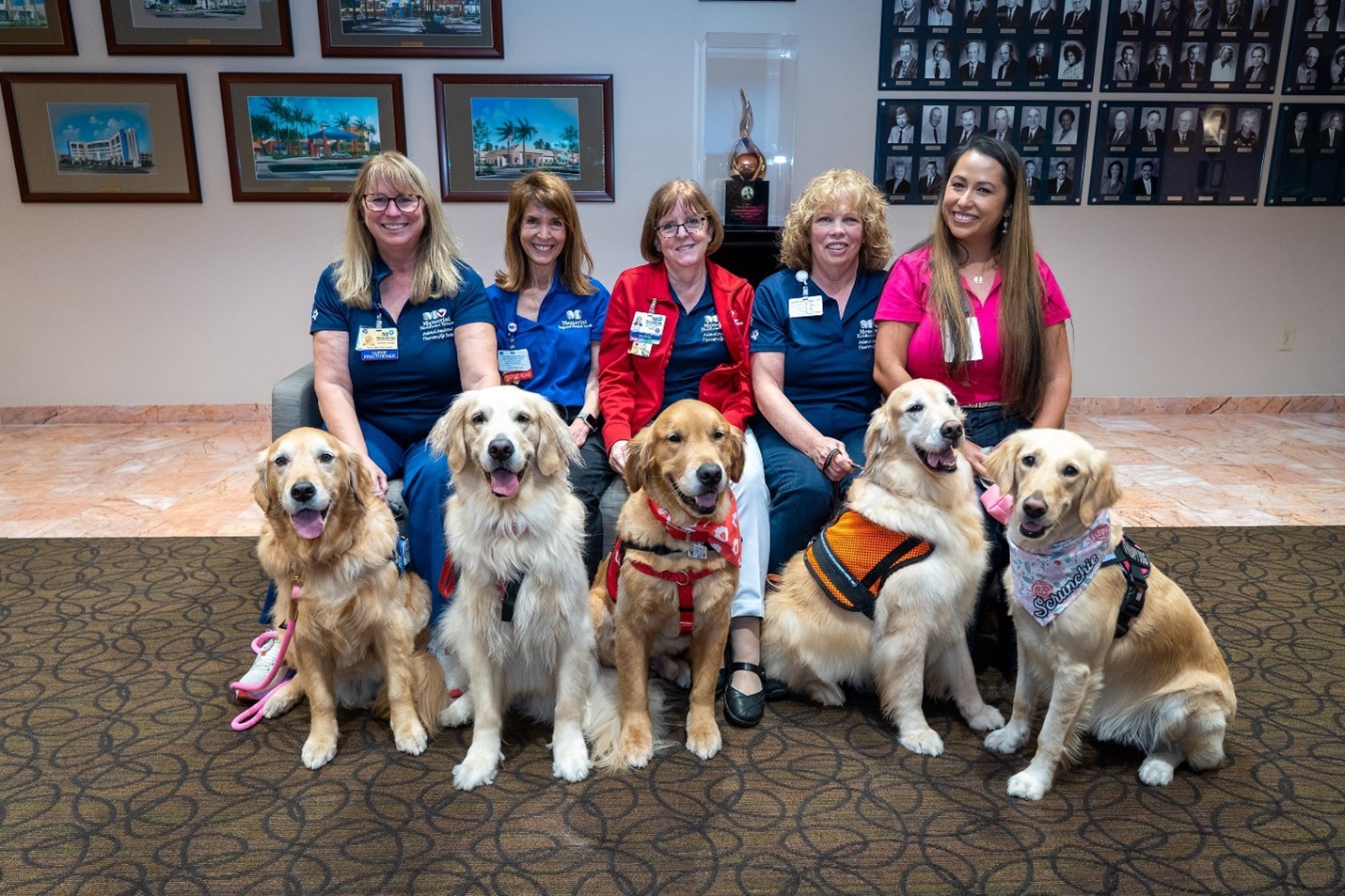 Therapy dogs play a very important role in cheering patients, families and employees too!