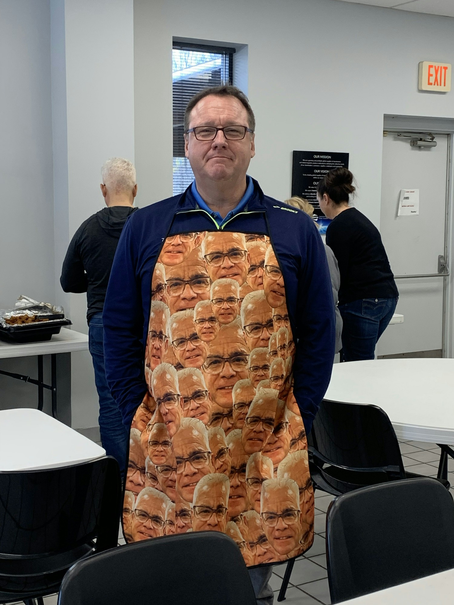 Employee BBQ's celebrating retiring VP Sales (New Chief Commercial Officer sporting the outgoing sales lead's face!)