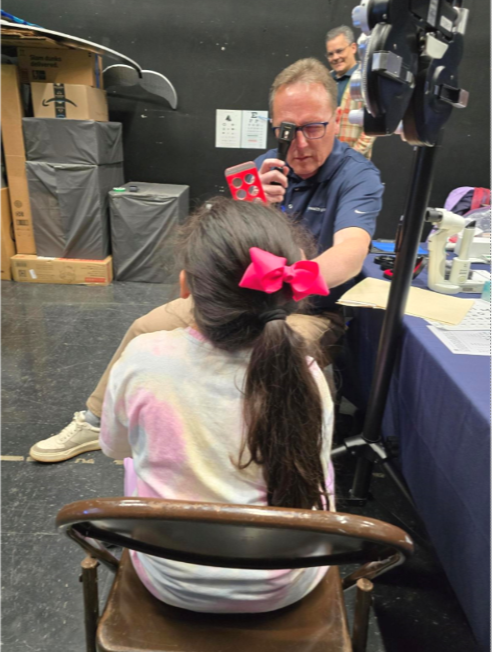 In partnership with county organizations, Dr. David Redman, and VSP, provided free eye care and glasses to children.