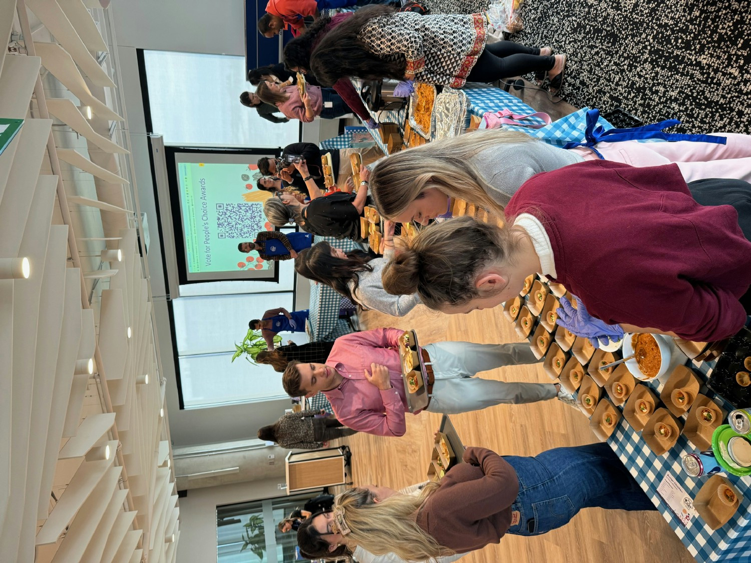 Annual Top Chef event where employees make food to raise money for a food bank & are judged by celebrity judges. 