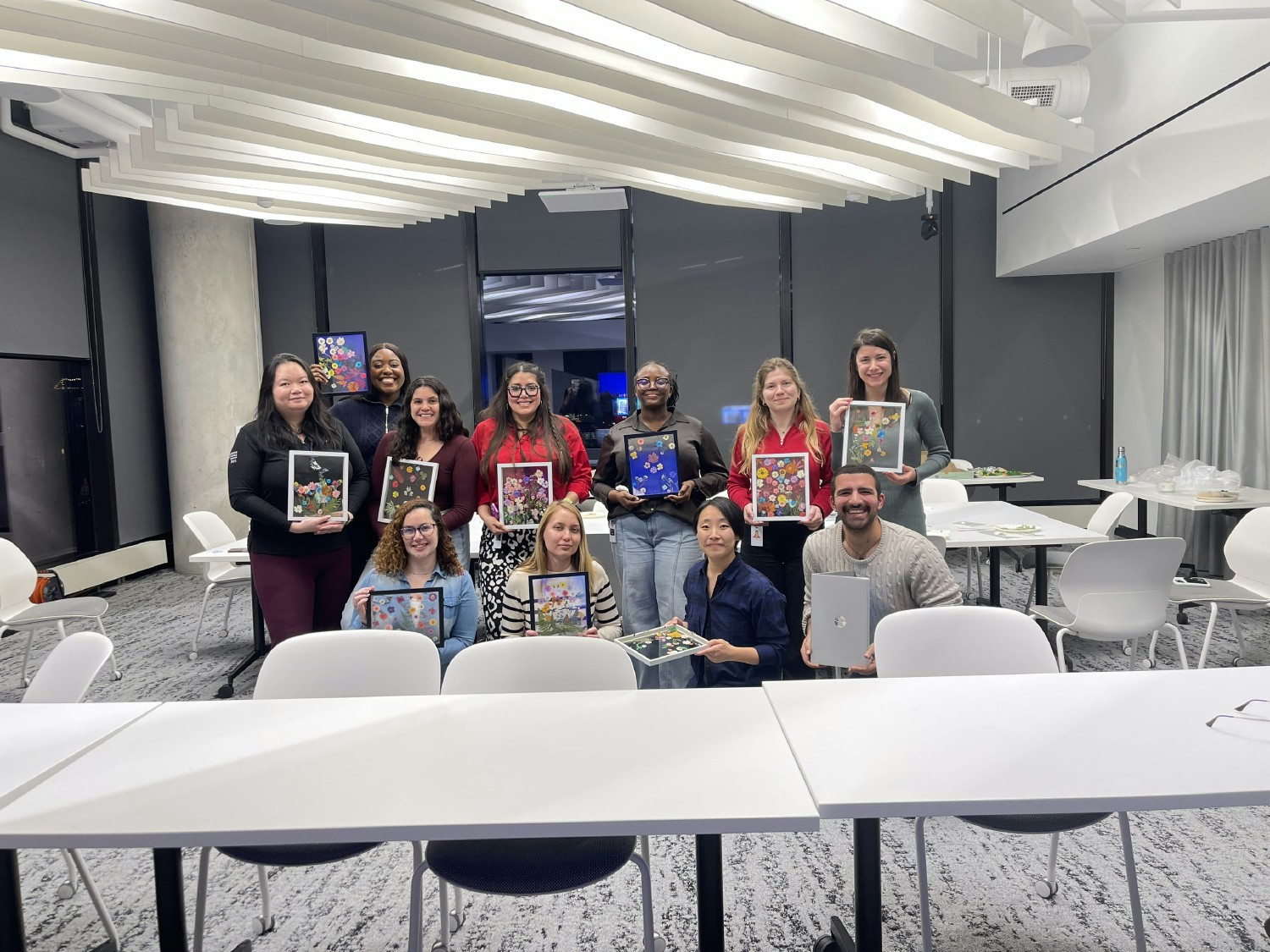 Achievers Women's Network Employee Resource Group hosting a flower pressed art event