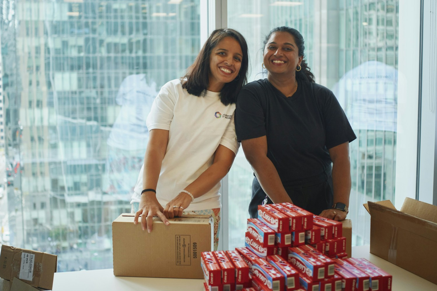 Two colleagues give their time and passion to make Kits for Cause as part of our Purpose@Work employee giving program 