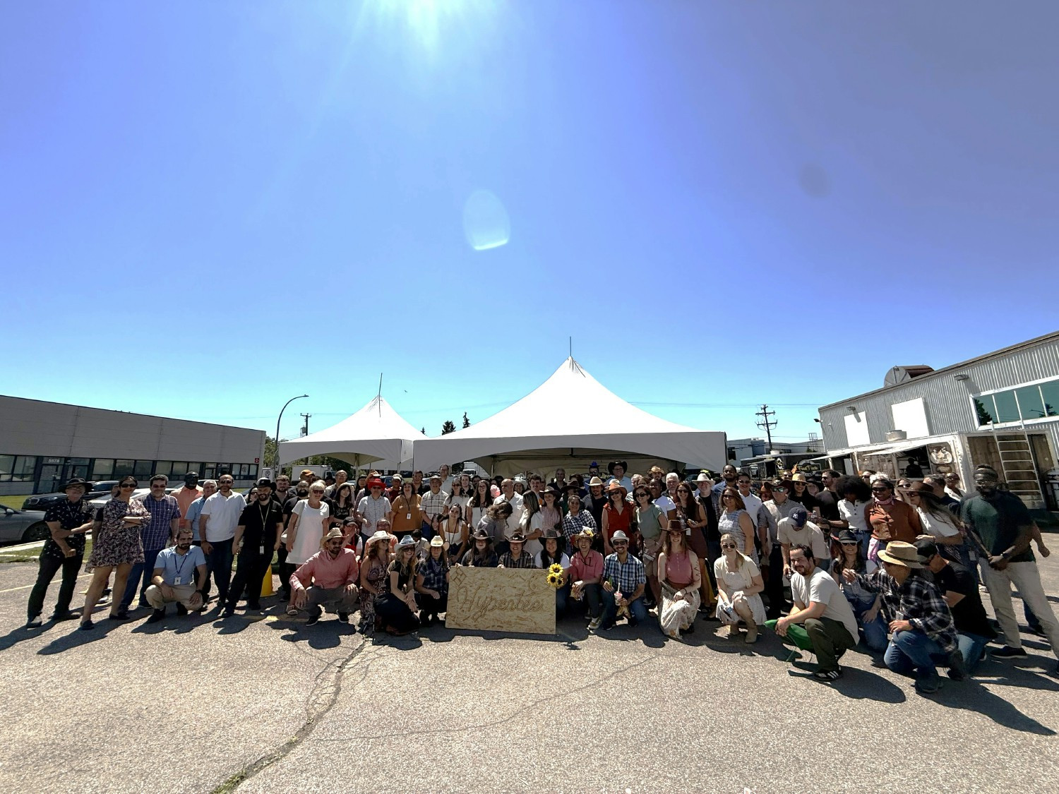 A group photo of Montreal employees at our head office's 2026 Annual Summer BBQ