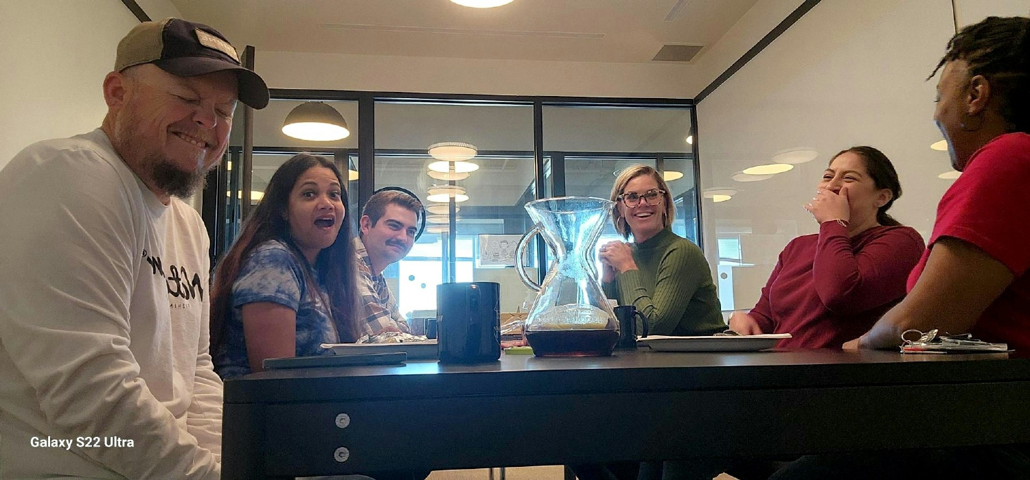 A team meeting in Houston office