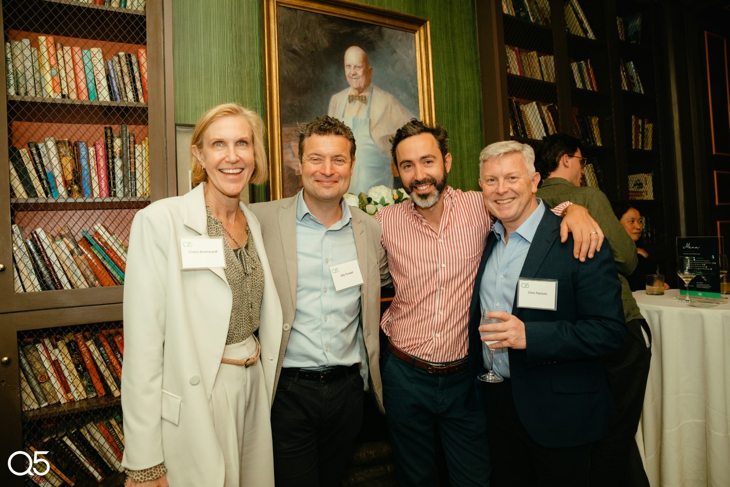 Partners of Q5, Olly, Chris, and Andy alongside North America MD Claire at the 10-year anniversary drinks in New York.
