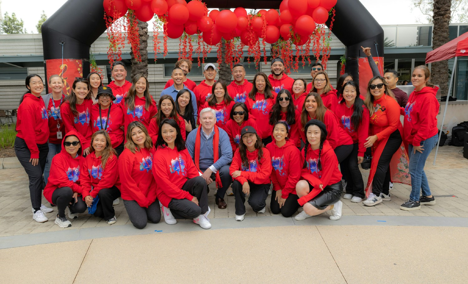 Asian American ERG members with CEO Brian Cassin at the Lunar New Year event in Costa Mesa, USA. 