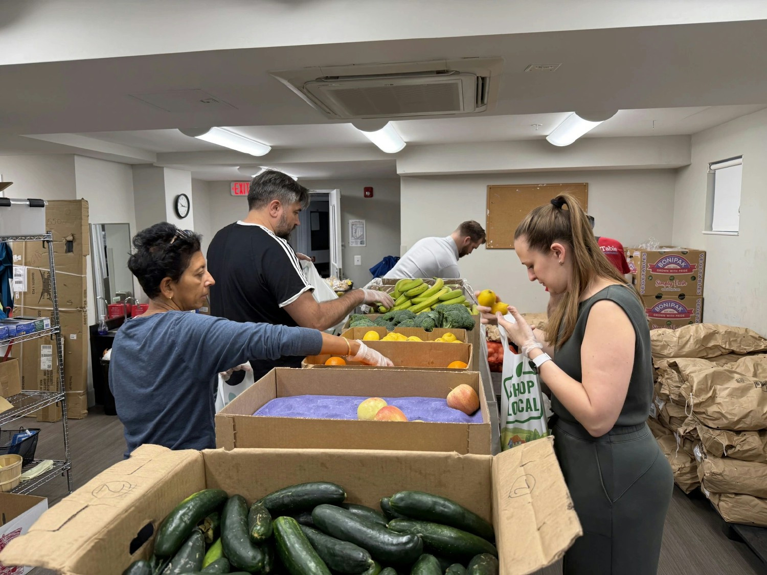 The Janes US team volunteered at Martha's Table, a market that promotes access to healthy food through no-cost groceries