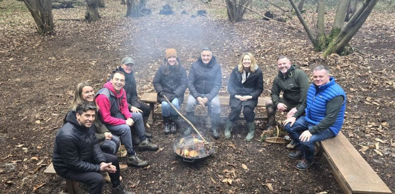 The System1 Exec team gathered around the campfire: bonding, sharing ideas, and building connections for the year ahead.